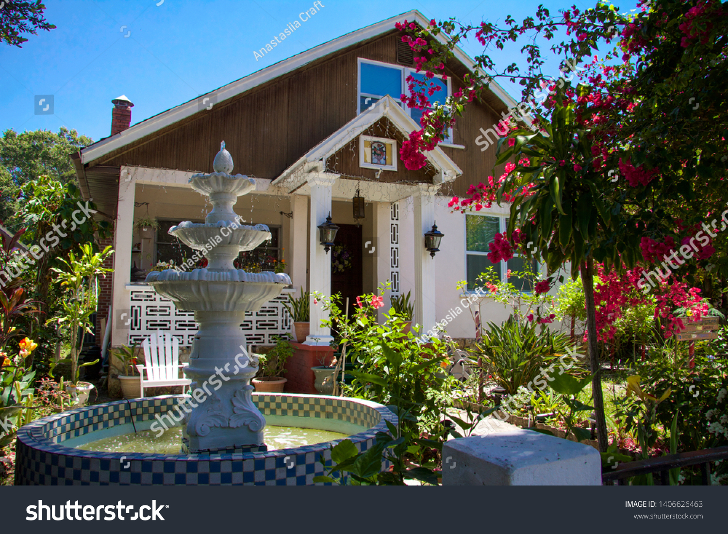 stock-photo-st-petersburg-florida-america-may-fountain-house-and-red-flowers-in-downtown-1406626463